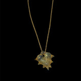 UV Spike Glass Heart Steel Necklace!